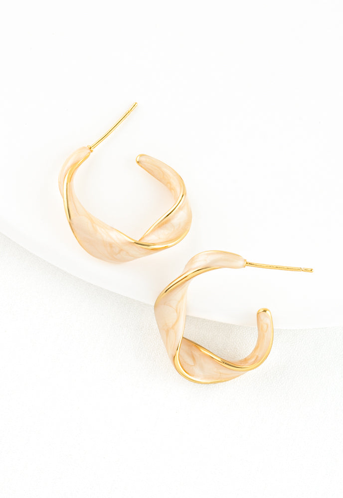 With a Twist Hoops in Soft Coral