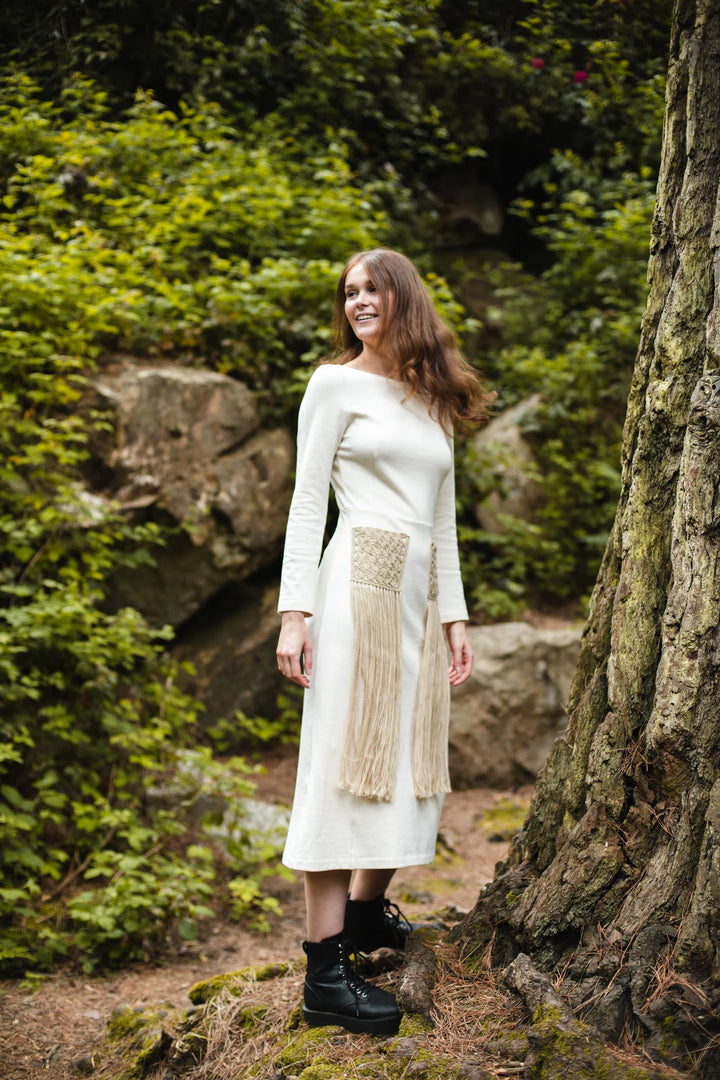 Organic dress with hand knitted pockets and fringing