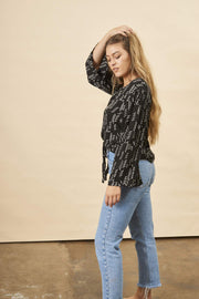 Stylized Feather Tie Knot Blouse in Black + Cream