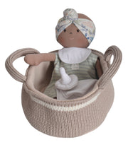 Knitted Carry Cot with Baby Dark Skin, Soother & Blanket