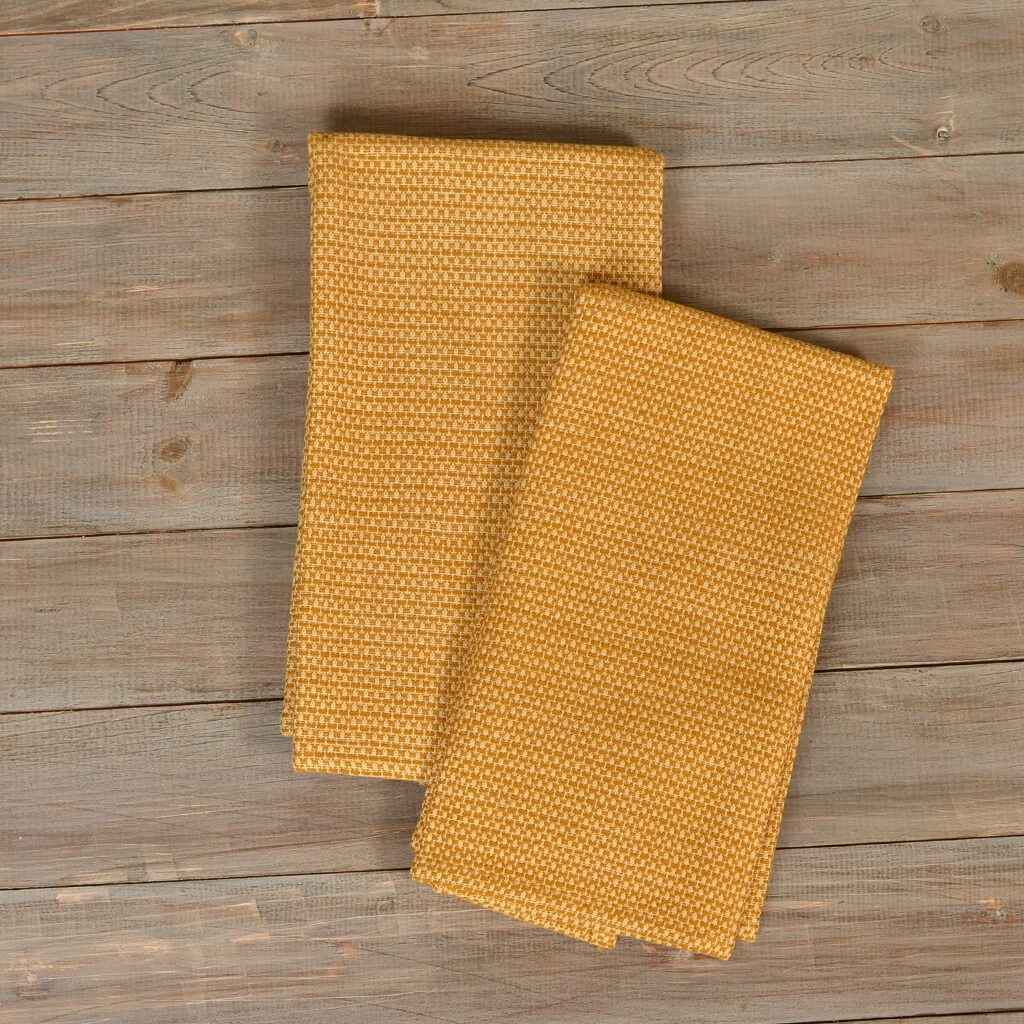 https://donegood.co/cdn/shop/products/DSC_1472-Hache-Towel-Set-Mustard-Champagne_7a96bc79-b414-4a7a-849e-92b45a35068d_1024x1024.jpg?v=1587002141