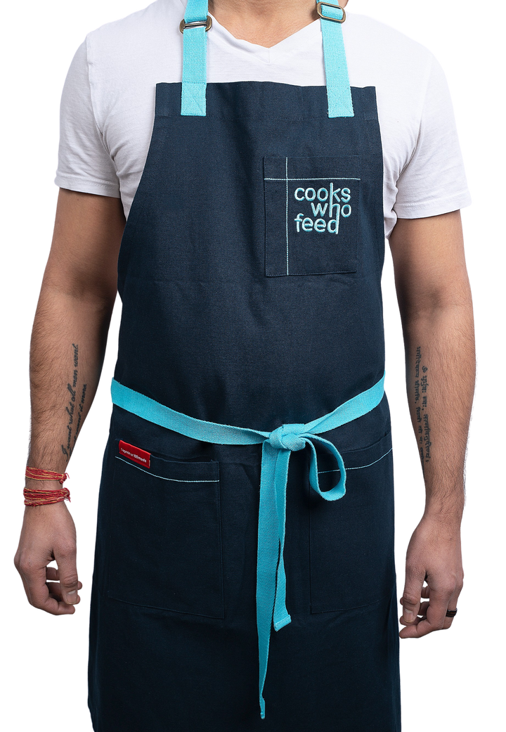 The Christine Cushing Adult Apron - Provides 100 Meals