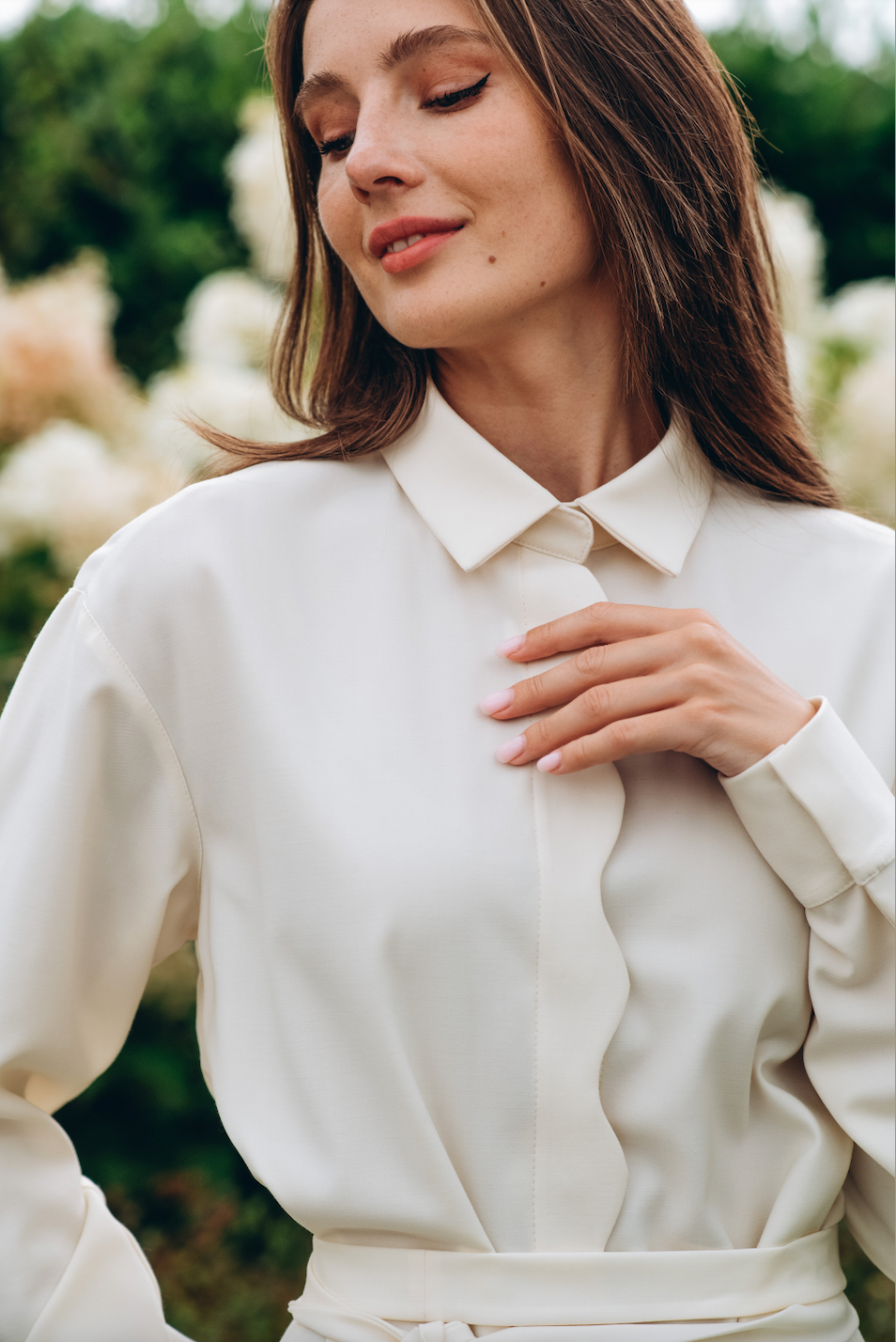 White wool shirt dress with wave-shaped placket