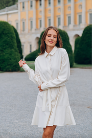 White wool shirt dress with wave-shaped placket