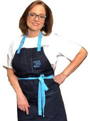 The Christine Cushing Adult Apron - Provides 100 Meals